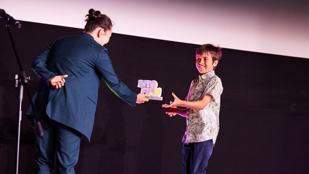 Best Animation - 11 and Under winner Alex receives his award on stage