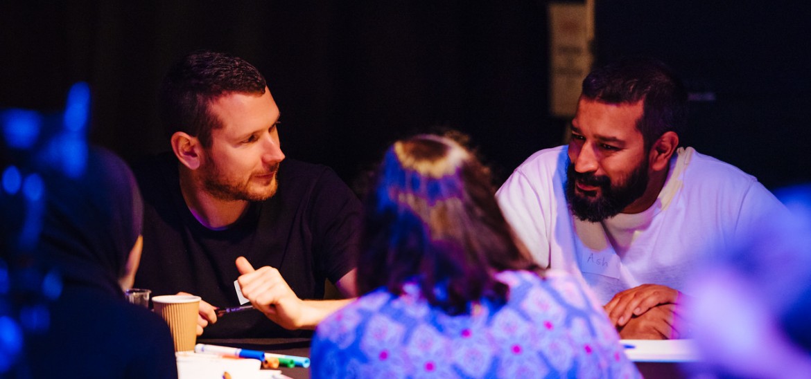 Educators in discussion at a CPD training event