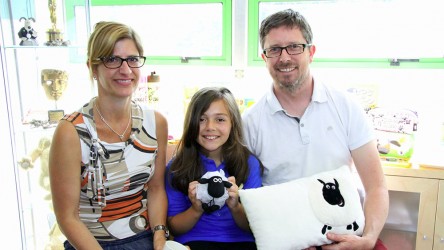 Jess with Shaun the Sheep producers holding Shaun